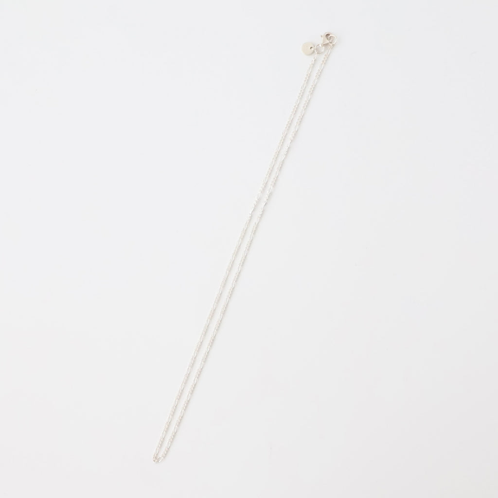 SL039 / TWNKL FGR NECKLESS - ref. / Web Store