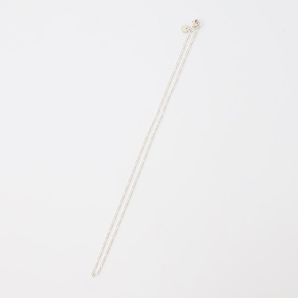 SL039 / TWNKL FGR NECKLESS - ref. / Web Store